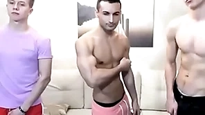 Three comely together with sexy boys