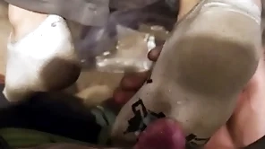 Several young guys dirty socks footjob