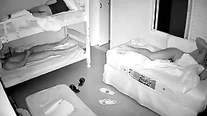 Through-and-through spy cam close by guys bedroom at night