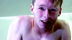 A straight flaxen boy is near tears after a long time being spanked